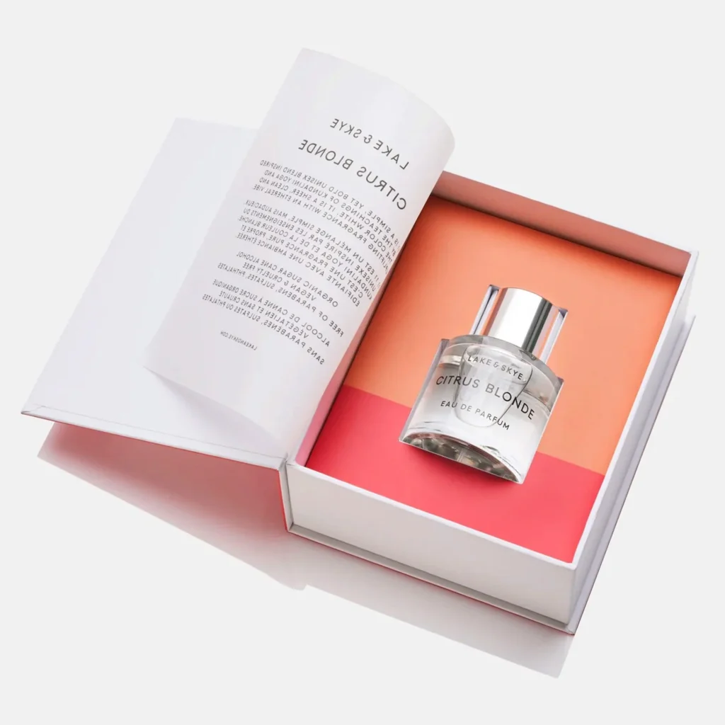 Custom insert for a book-shaped perfume packaging box